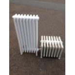 A low Edwardian cast iron radiator with eight panels; and an unused modern Victorian style