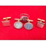 A pair of French Murat cufflinks with engine turned rectangular panels; a gents signet ring with