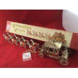 A boxed Lesley 1953 coronation coach, with silvered vehicle and team of handpainted horses & riders.