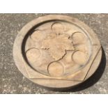 A carved hardwood mould of circular wheel form, having hexagonal panel with central leaf.