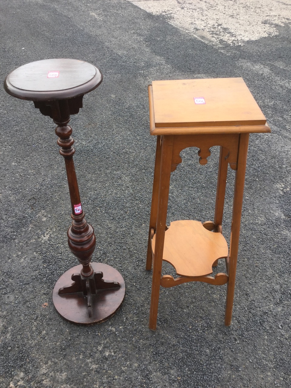 A square jardinière stand with shaped aprons raised on rounded angled legs joined by quatrefoil