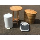A set of EKS bathroom sales; an oval cane laundry basket; a tubular pedal bin; and a circular