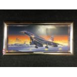 Queen of the sky, print of Concorde in flight, with backlit effect and in silver painted frame.