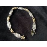 An 18ct gold diamond bracelet