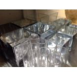 Eleven square heavy glass vases - some silvered; and a set of eight tubular glass vases. (19)