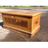 A Victorian scumbled pine blanket box, the interior with candlebox, mounted with oval brass