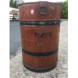 A ribbed scumbled tin flour bin of barrel form, having hinged lid.