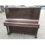 An Edwardian upright piano by H Matz & Co, with overstrung cast iron frame and seven octave