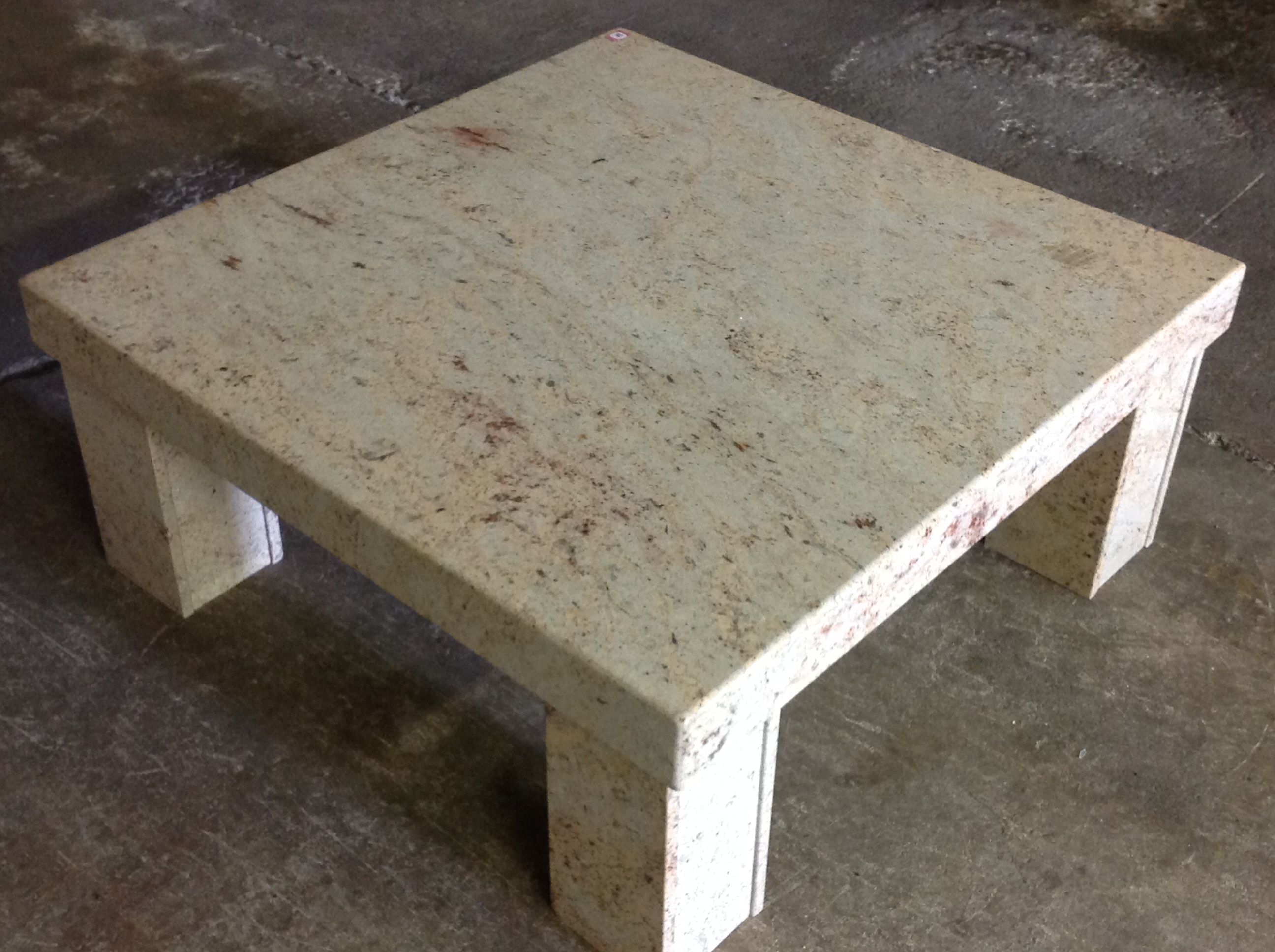 A large polished granite coffee table, the square slab top supported on four channelled column legs. - Image 2 of 3