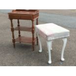 An upholstered dressing table stool raised on cabriole legs; and a whatnot stand on turned column