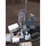 A Kirby Micron Magic vacuum cleaner, the machine with all sorts of attachments, bags, containers,