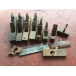 Ten block & moulding planes of various sorts & sizes; and a large mitre saw. (11)