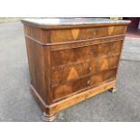 A European walnut chest, the marble top with canted corners above four long drawers and plain apron,