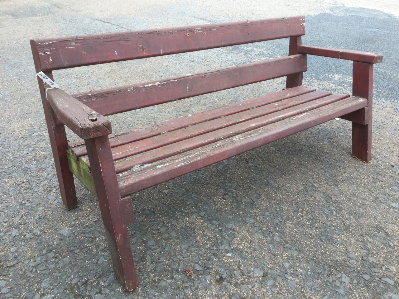 A rectangular garden bench of slatted construction, having platform arms and angled legs. - Image 3 of 3
