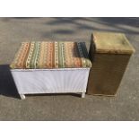 A square lloyd loom style linen basket with hinged lid; and a lloyd loom style ottoman box with