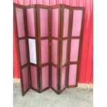 A Victorian 6ft mahogany six-fold screen, each piece with three fabric covered panels, mounted