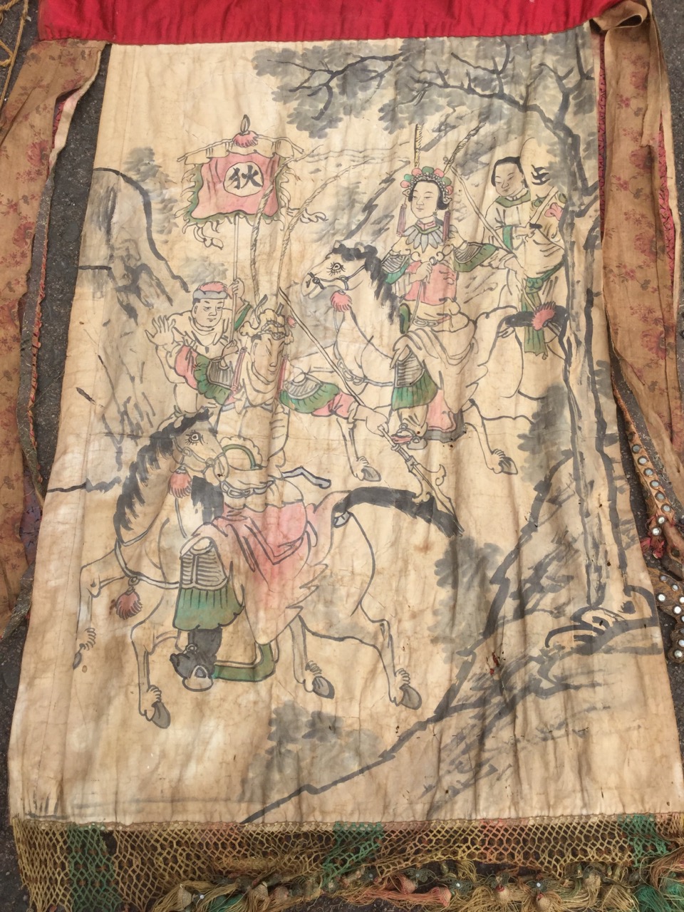 A nineteenth century Chinese banner sewn with embroidered panels and characters in coloured & gilt - Image 2 of 3