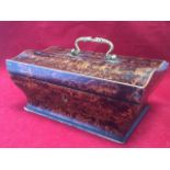 A Victorian partridge-wood jewellery casket, the waved lid mounted with ormolu snake handle,