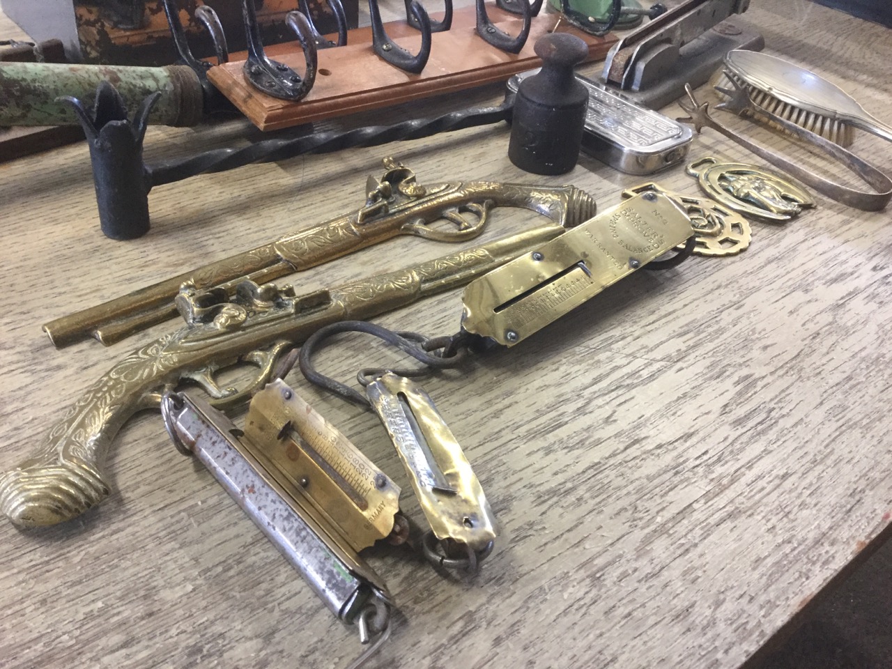 A box of miscellaneous items including rows of pegs, a mincer, four brass Salter scales, a spoon - Image 3 of 3