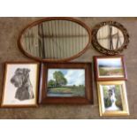 An oval oak framed mirror with bevelled plate; four miscellaneous pictures including a river