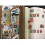 A 'schoolboy' stamp collection contained in a Cardinal album, with a quantity of loose stamps,