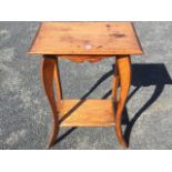 An art nouveau oak side table,