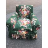 An Edwardian upholstered armchair