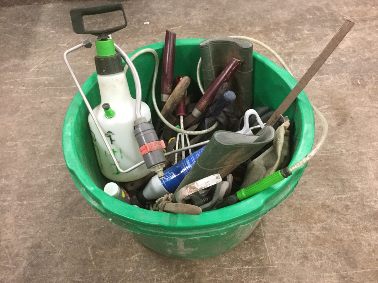 A pair of Garden trugs containing garden tools - shears, gloves, trowels, etc. (A lot)