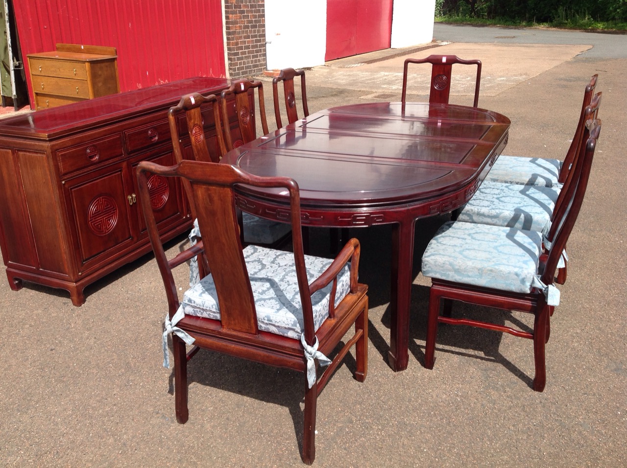 A Chinese rosewood style dining room suite.