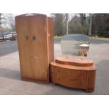 A walnut dressing table and matching wardrobe, both mounted with brass rossette handles. (2)