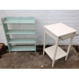 A painted open bookshelf with shaped top; and a painted square bathroom table with towel rail