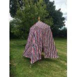 An empire bathing tent, with striped canvas on wood frame