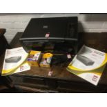 A Kodak ESP printer/scanner/copier/ complete with instructions, spare ink cartridges, etc. (A lot)