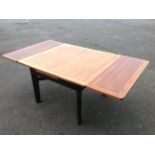 A mahogany draw-leaf coffee table