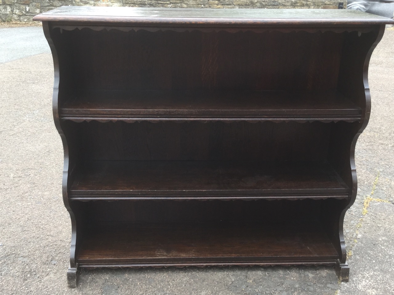 An oak open bookcase, the moulded shelves with shaped aprons, with waved sides. - Image 3 of 3