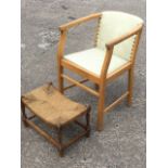 A rectangular stool with rush seat raised on turned legs; and a beech armchair with studded