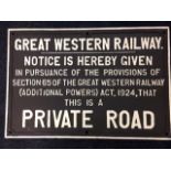 A rectangular cast iron Great Western Railway style sign.