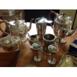 A boxed Sewdish Germetco stainless steel bowl; a silver plated four-piece teaset by Walker & Hall;