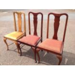 A pair of Queen Anne style mahogany dining chairs