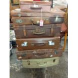 A leather suitcase with White Star Line Cunard labels; and five other cases, one leather, (6)