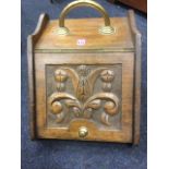 A Victorian hardwood coal scuttle