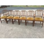 A set of six Georgian style mahogany dining chairs,