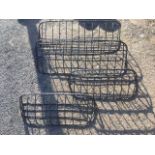 Two pairs of window trough boxes, with rounded wrought iron cages for plants. (4)