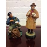 A Royal Doulton figurine of a shepherd - Lambing Time, HN1890; and another Doulton figure -