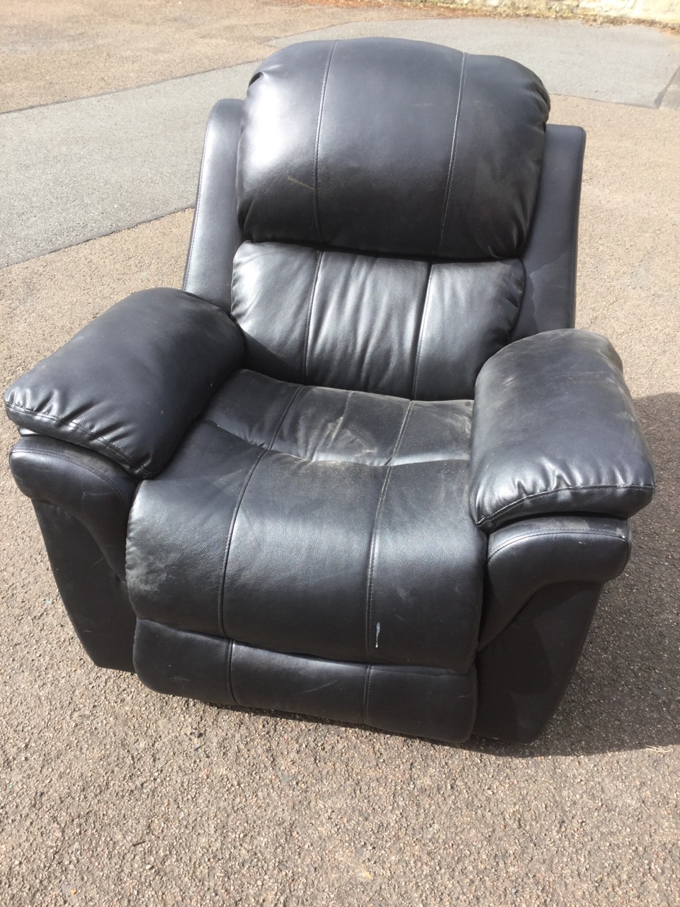 A contemporary leather reclining armchair, with padded back, arms and seat, complete with integral - Image 3 of 3