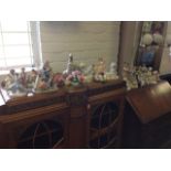 Miscellaneous figurines including a collection of birds, porcelain, capo-de-monte, a pair of Dutch