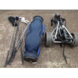 A set of Titeist golf clubs in Vantage bag with Callaway driver,