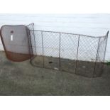 A 4ft 6in wirework nursery fireguard; and an arched mesh sparkguard. (2)
