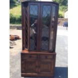 A Jaycee glazed oak dresser cabinet