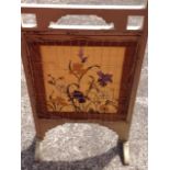 A late Victorian painted firescreen
